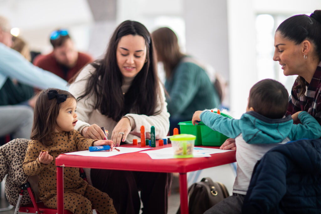Toddlers drawing with parents