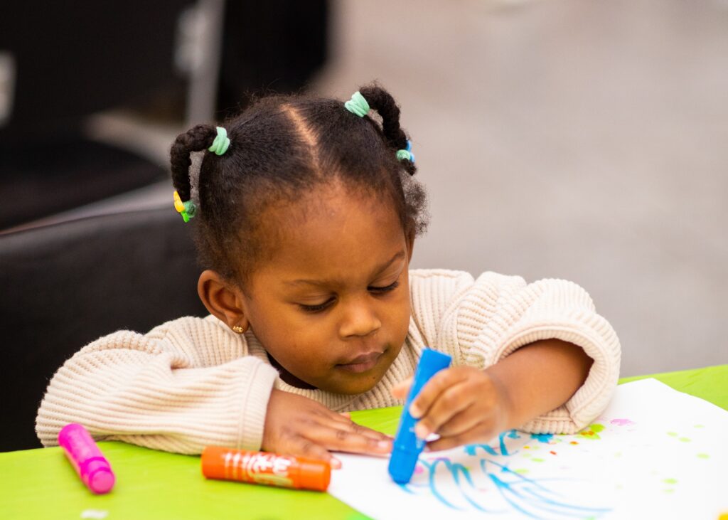 Toddler drawing with markers