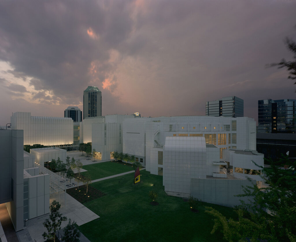 Aerial view of the High Museum of Art's entire campus at dusk.